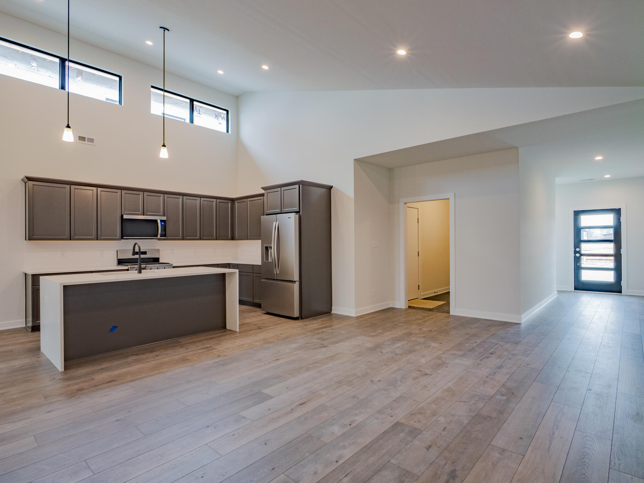 244 Sawgrass Drive Crown Point, IN 46307 - Photo 5 of 19 a large room with a lot of cabinets and wooden floor