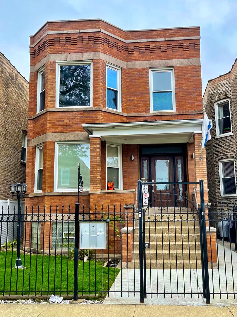 2122 North Keystone Avenue, Unit G Chicago, IL 60639 - Photo 1 of 4 front view of a house