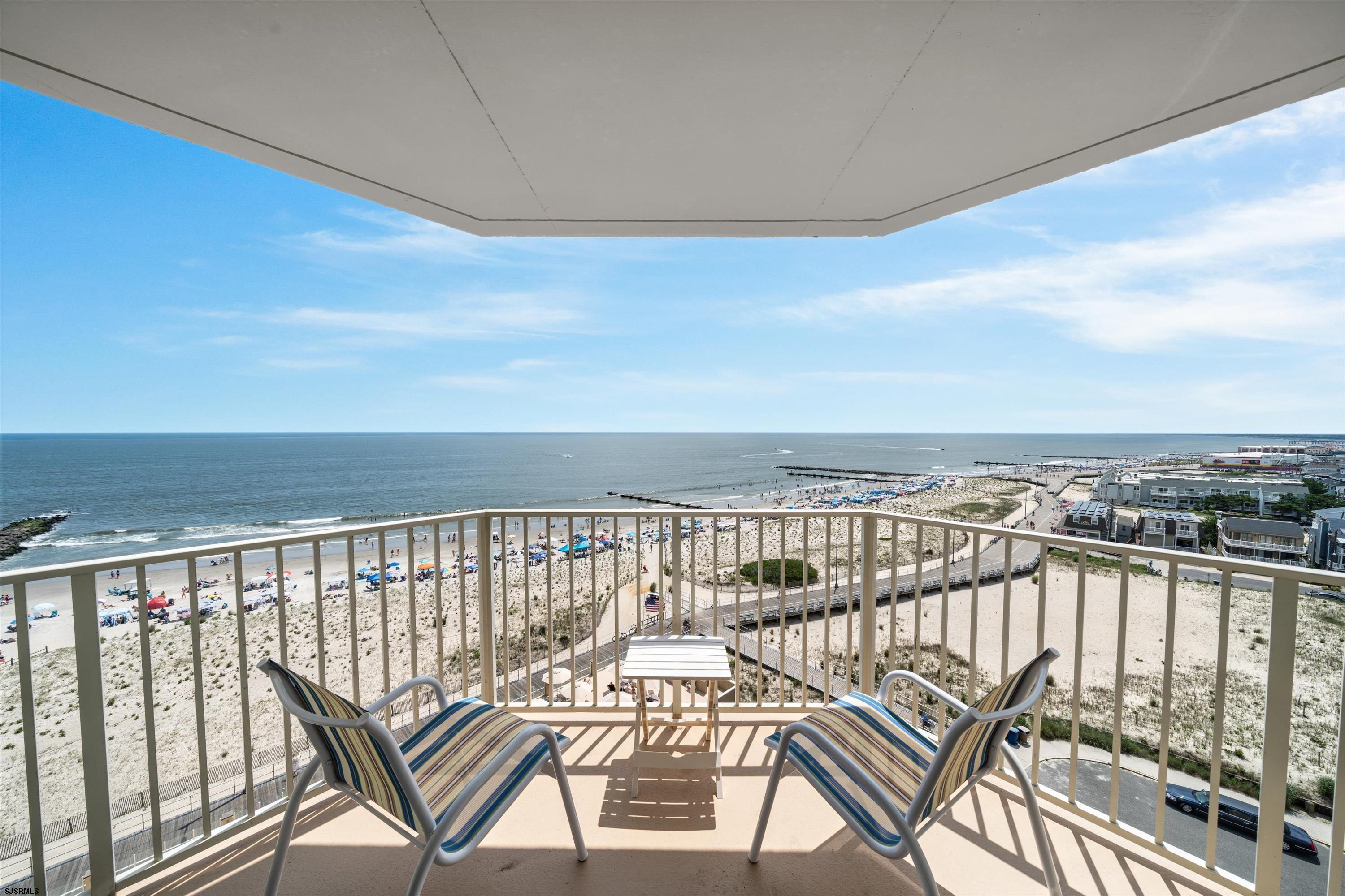 322 Boardwalk, Unit 1007 Ocean City, NJ 08226 - Photo 11 of 27 a view of a balcony with wooden floor and city view