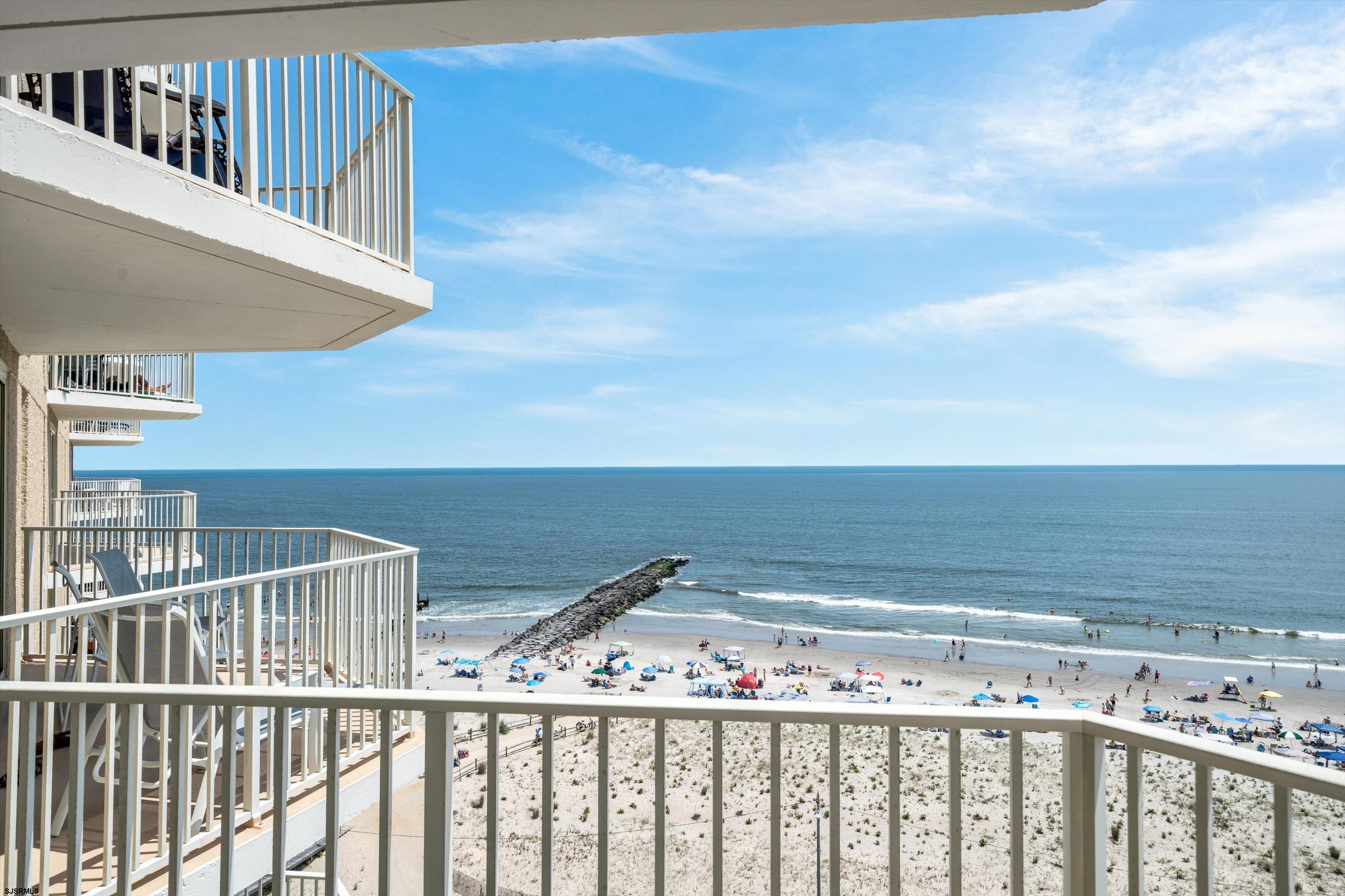 322 Boardwalk, Unit 1007 Ocean City, NJ 08226 - Photo 12 of 27 a view of a balcony with wooden floor