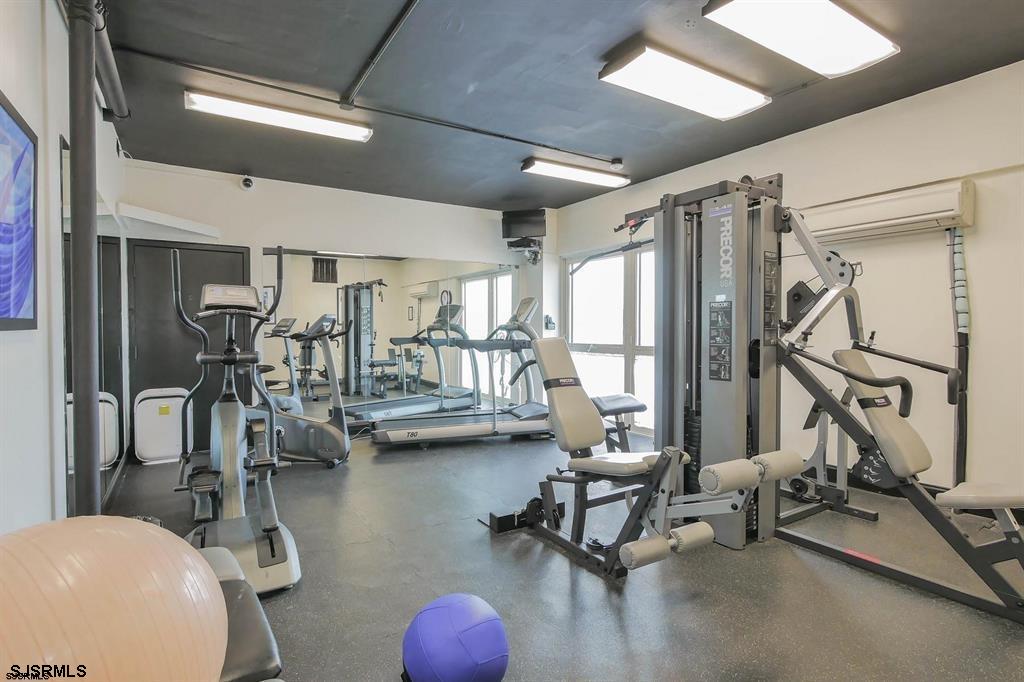 322 Boardwalk, Unit 1007 Ocean City, NJ 08226 - Photo 19 of 27 a view of a room with gym equipment