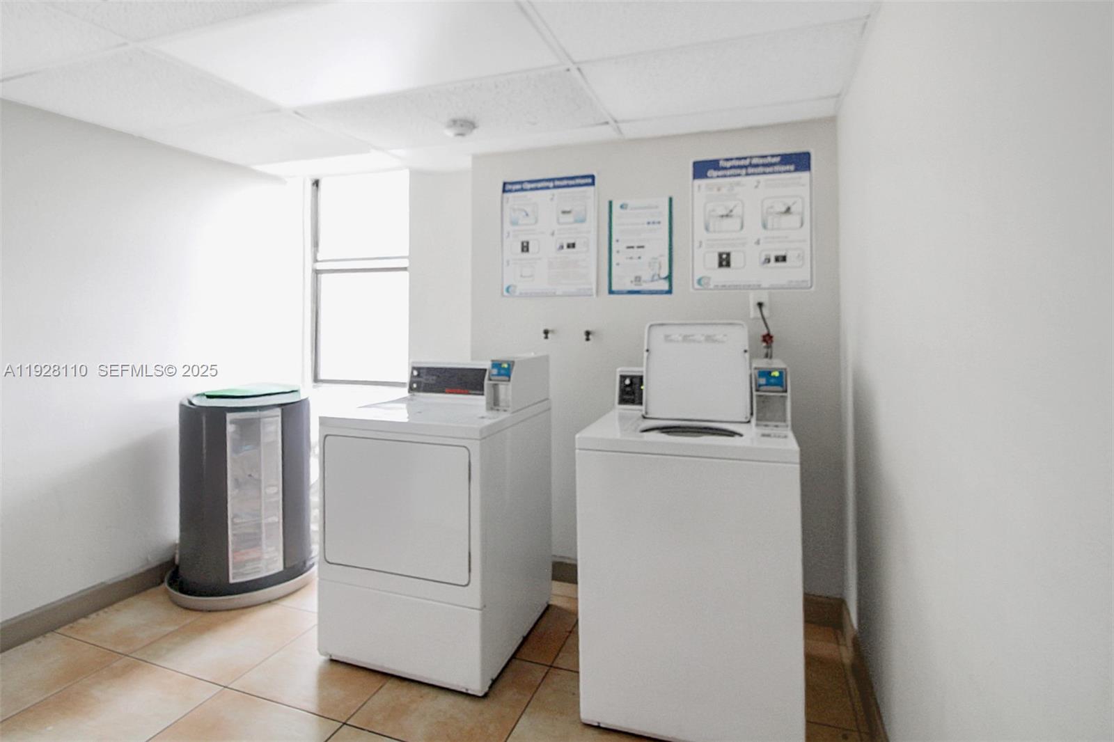 1825 West 44th Place, Unit 1111 Hialeah, FL 33012 - Photo 18 of 22 a utility room with dryer and washer