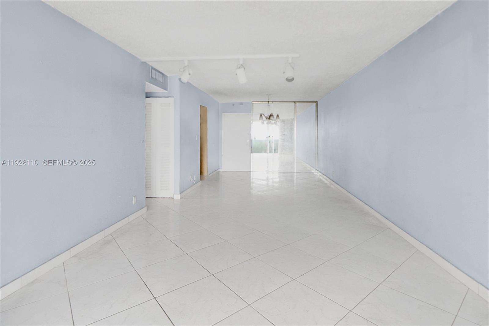 1825 West 44th Place, Unit 1111 Hialeah, FL 33012 - Photo 7 of 22 a view of an empty room