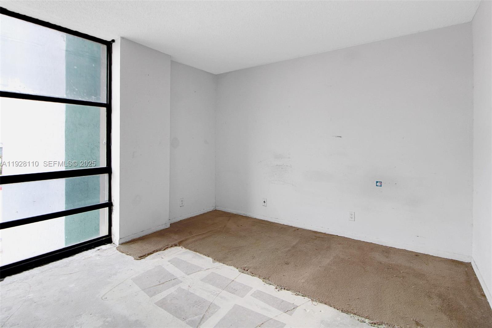 1825 West 44th Place, Unit 1111 Hialeah, FL 33012 - Photo 10 of 22 a view of an empty room