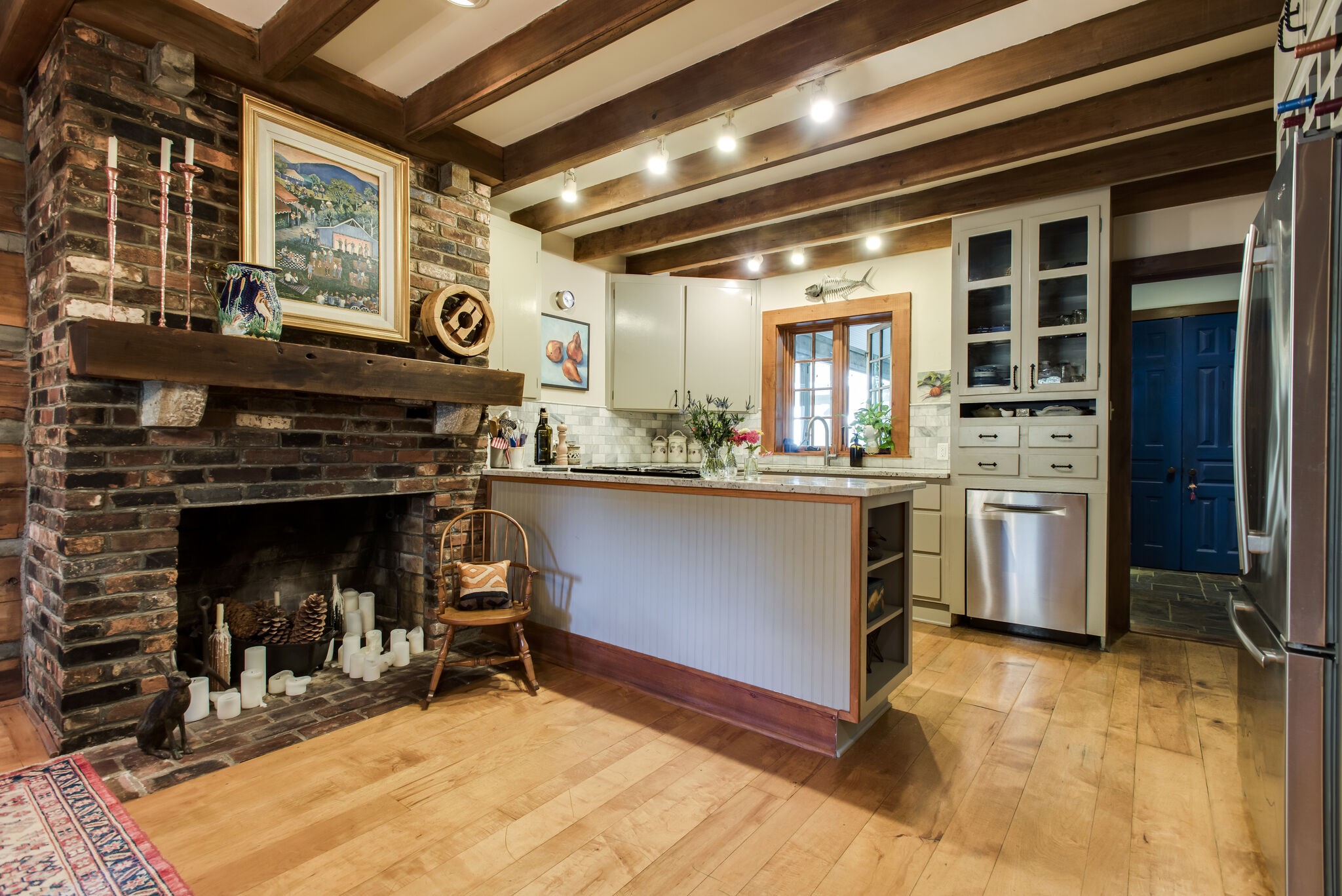 6230 Bresslyn Road Nashville, TN 37205 - Photo 15 of 53 a kitchen with a stove and a fireplace
