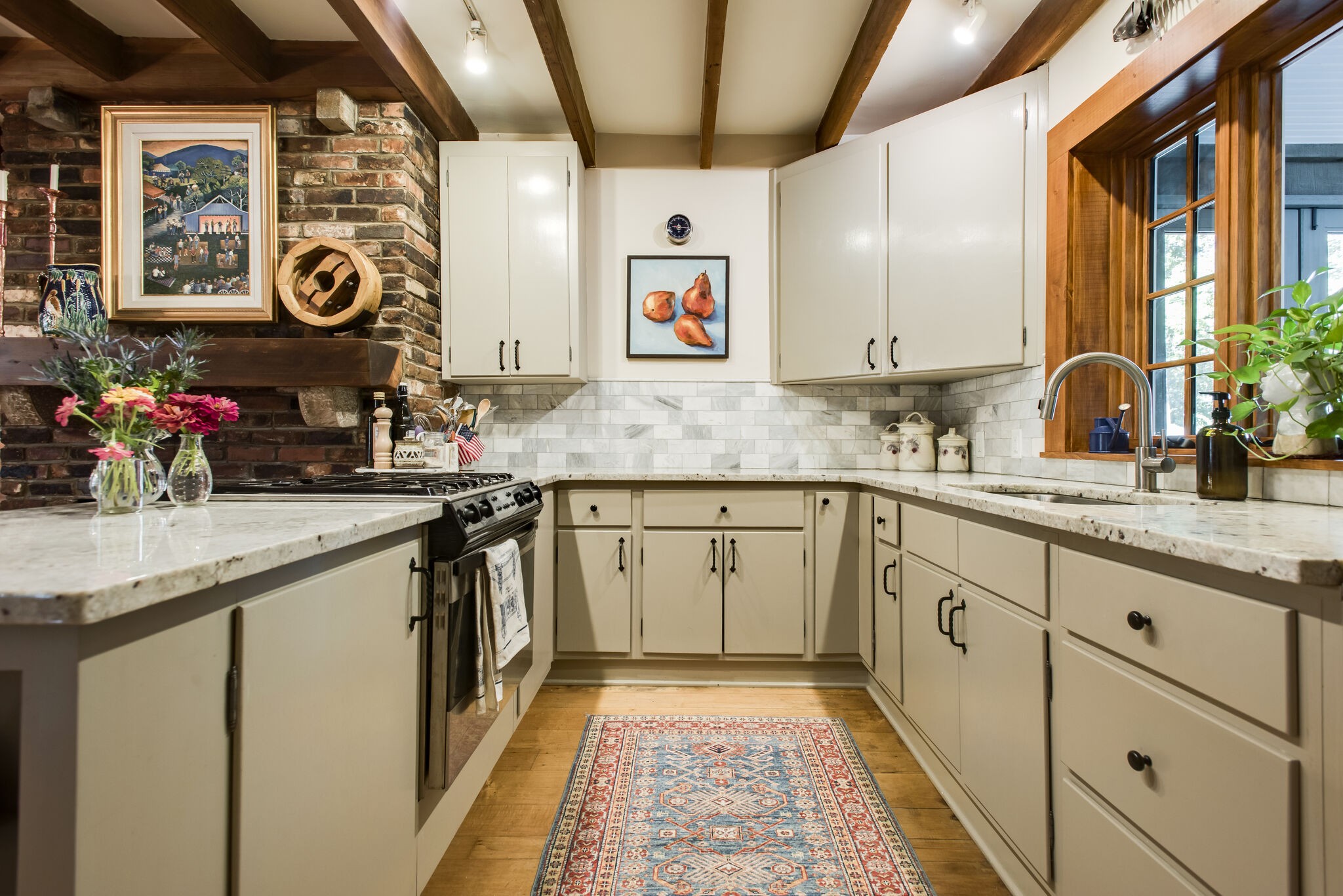6230 Bresslyn Road Nashville, TN 37205 - Photo 16 of 53 a kitchen with cabinets and window