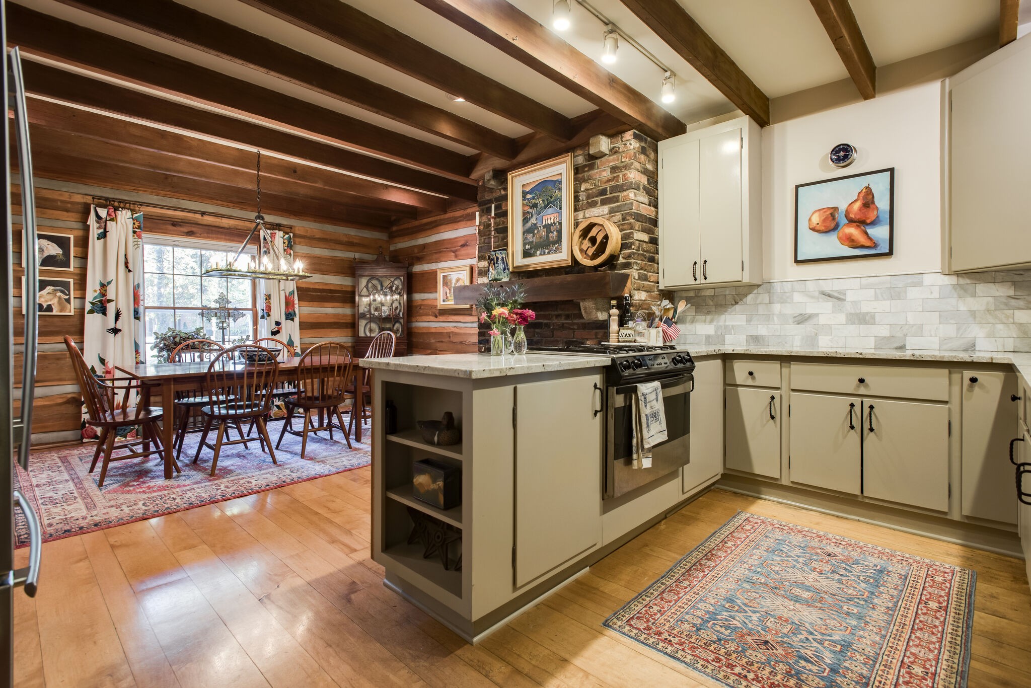 6230 Bresslyn Road Nashville, TN 37205 - Photo 17 of 53 a kitchen with a stove top oven and cabinets