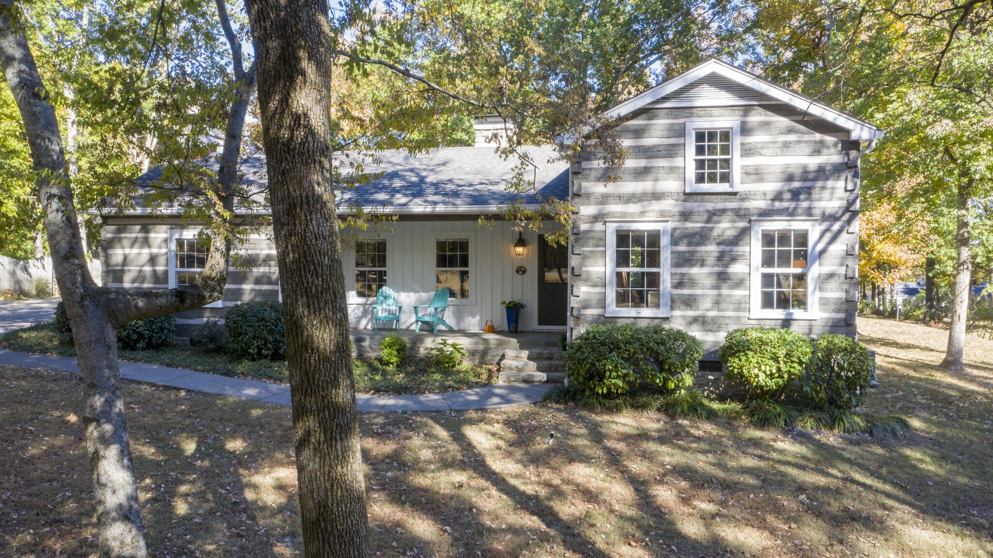 6230 Bresslyn Road Nashville, TN 37205 - Photo 2 of 53 a front view of a house with a yard