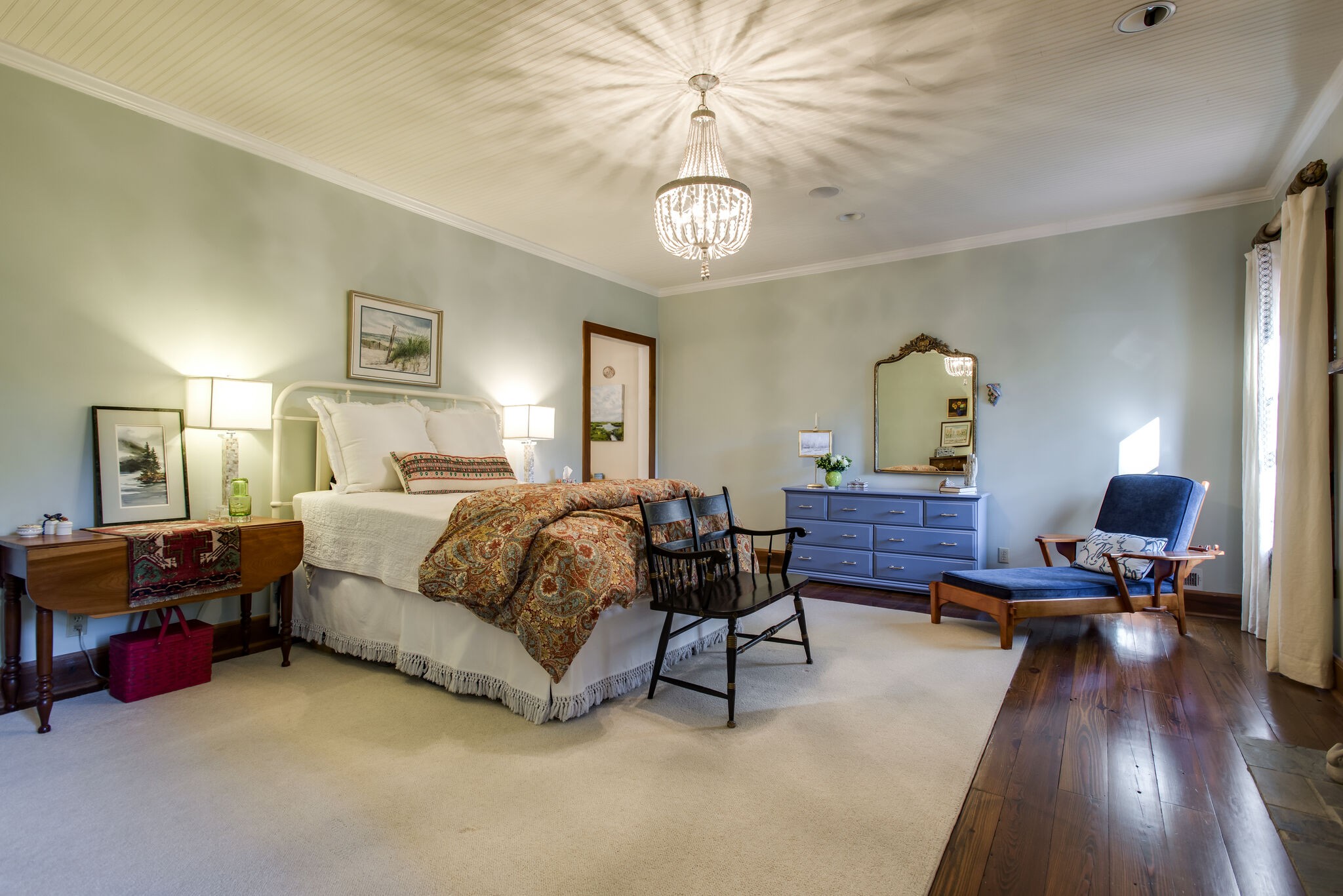 6230 Bresslyn Road Nashville, TN 37205 - Photo 27 of 53 a bedroom with furniture and a wooden floor