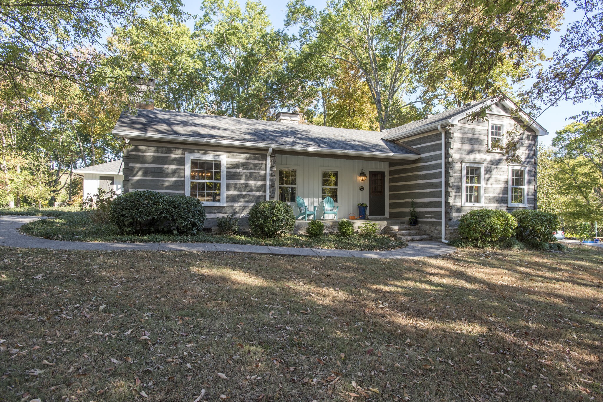 6230 Bresslyn Road Nashville, TN 37205 - Photo 4 of 53 a front view of house with yard and trees around
