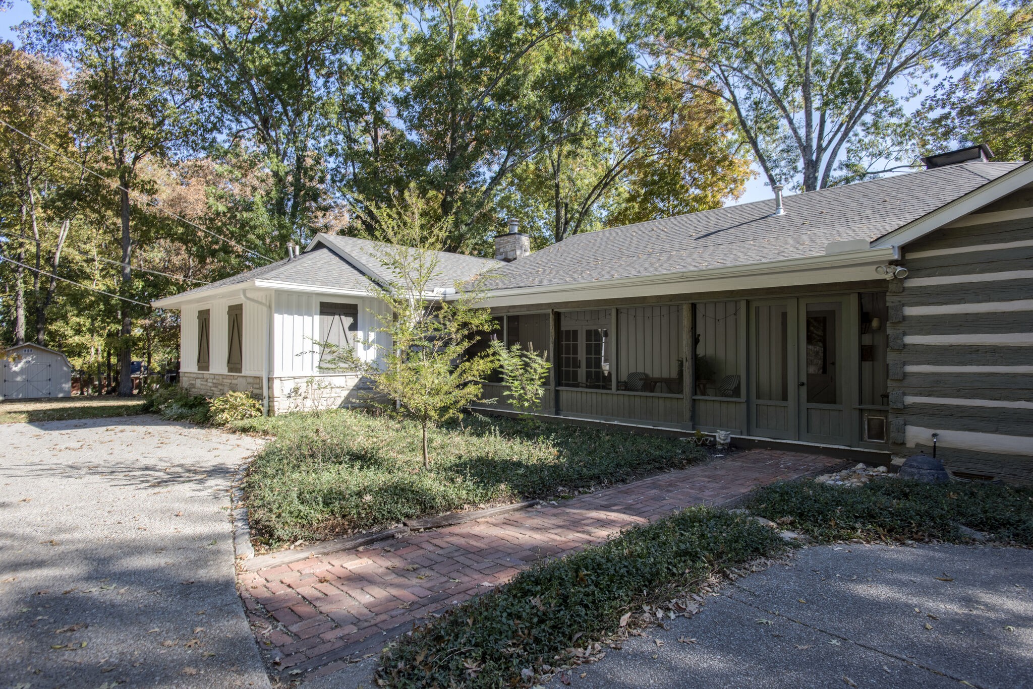 6230 Bresslyn Road Nashville, TN 37205 - Photo 45 of 53 a front view of a house with a garden