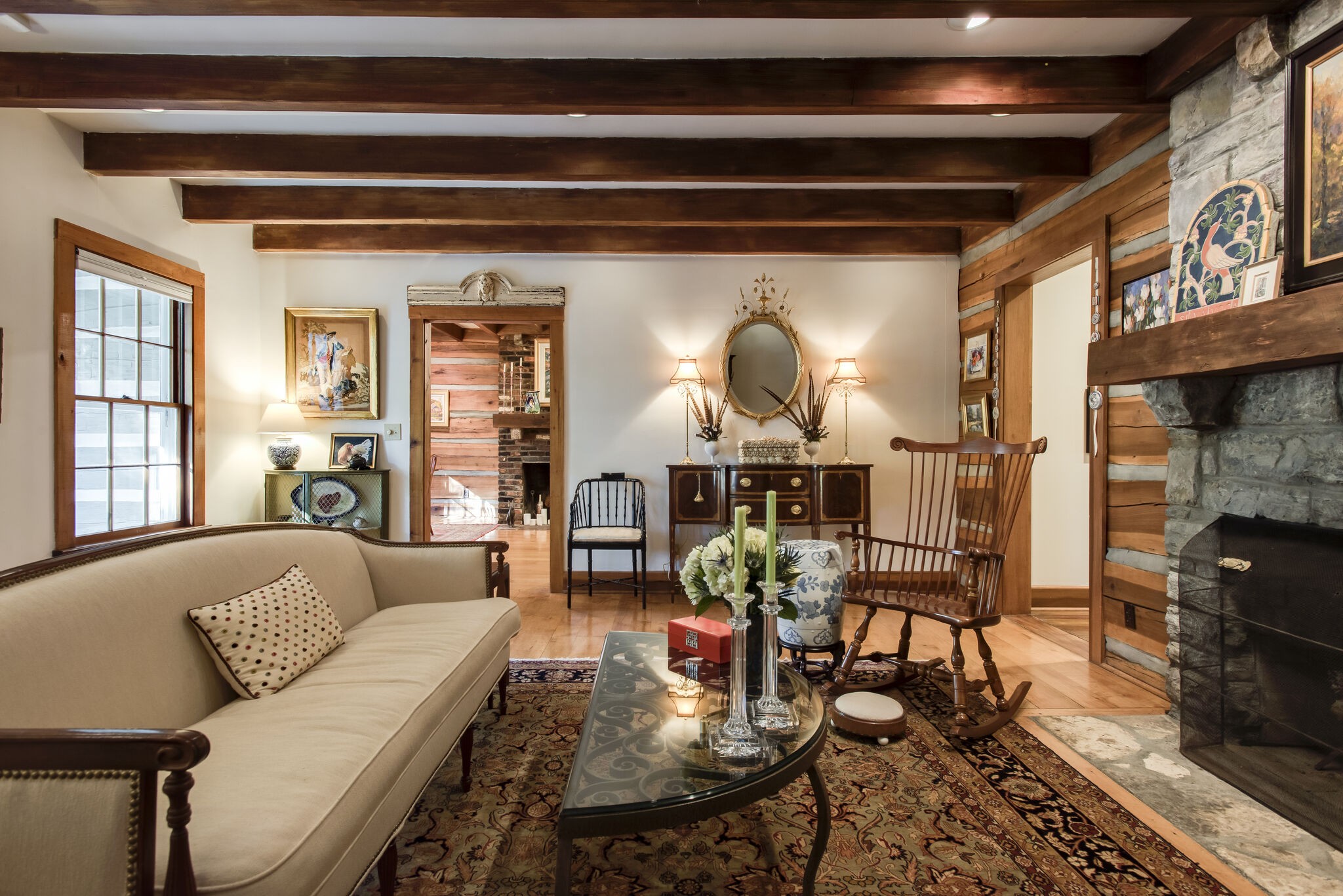 6230 Bresslyn Road Nashville, TN 37205 - Photo 7 of 53 a living room with furniture and a fireplace