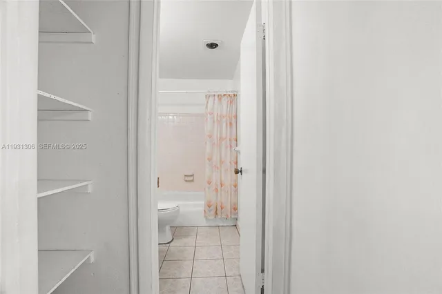 a bathroom with a toilet