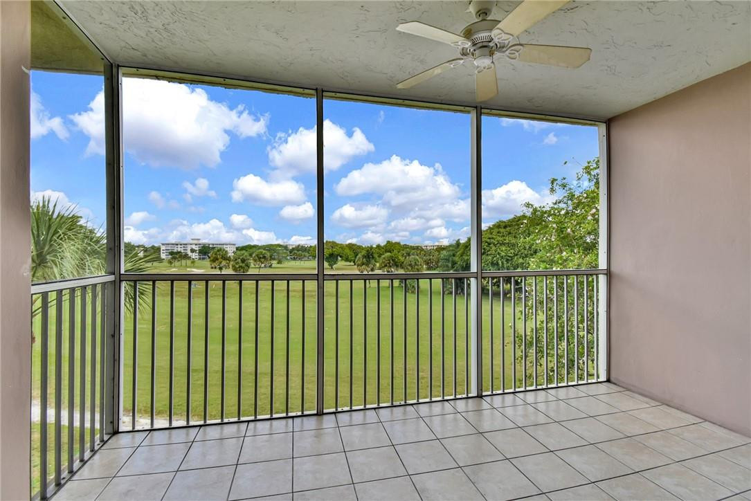 2601 South Course Drive, Unit 409 Pompano Beach, FL 33069 - Photo 23 of 58 a view of a balcony