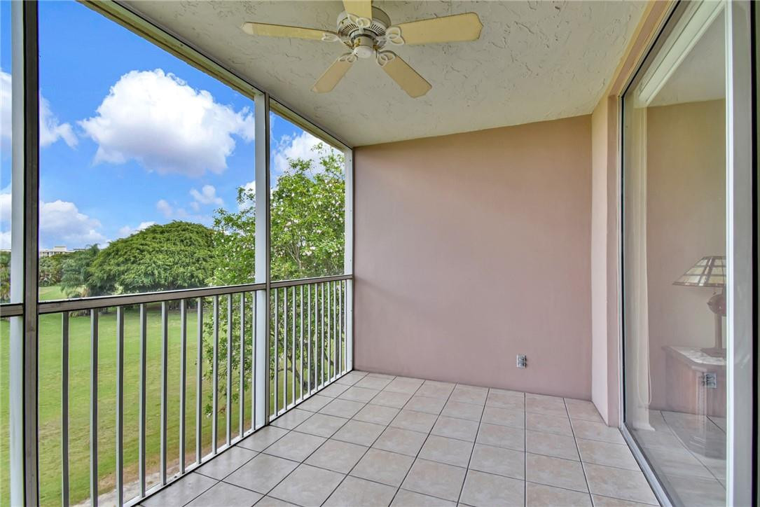 2601 South Course Drive, Unit 409 Pompano Beach, FL 33069 - Photo 25 of 58 a view of a balcony