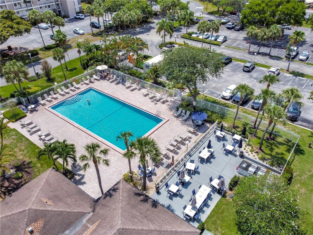 2601 South Course Drive, Unit 409 Pompano Beach, FL 33069 - Photo 36 of 58 an aerial view of a residential houses with outdoor space