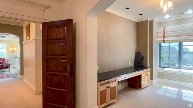 426 West Center Street Parowan, UT 84761 - Photo 54 of 107 Built-in desk cabinetry with a dark countertop and light wood-finish doors