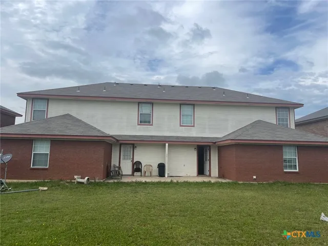 a view of a street with cars