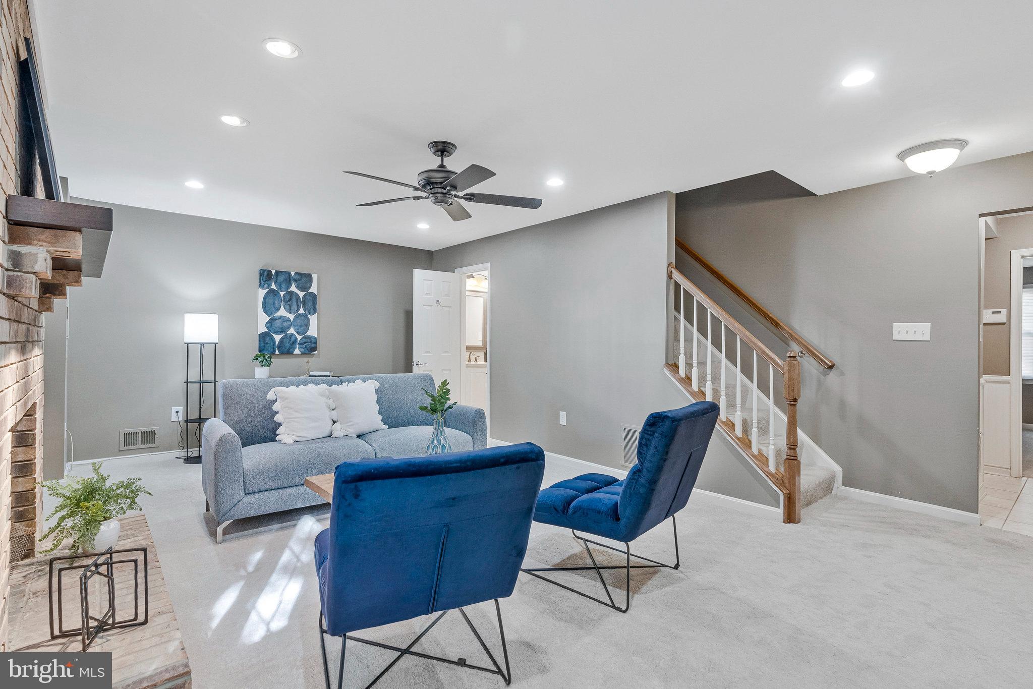 2043 Pieris Court Vienna, VA 22182 - Photo 29 of 43 a living room with furniture and white walls