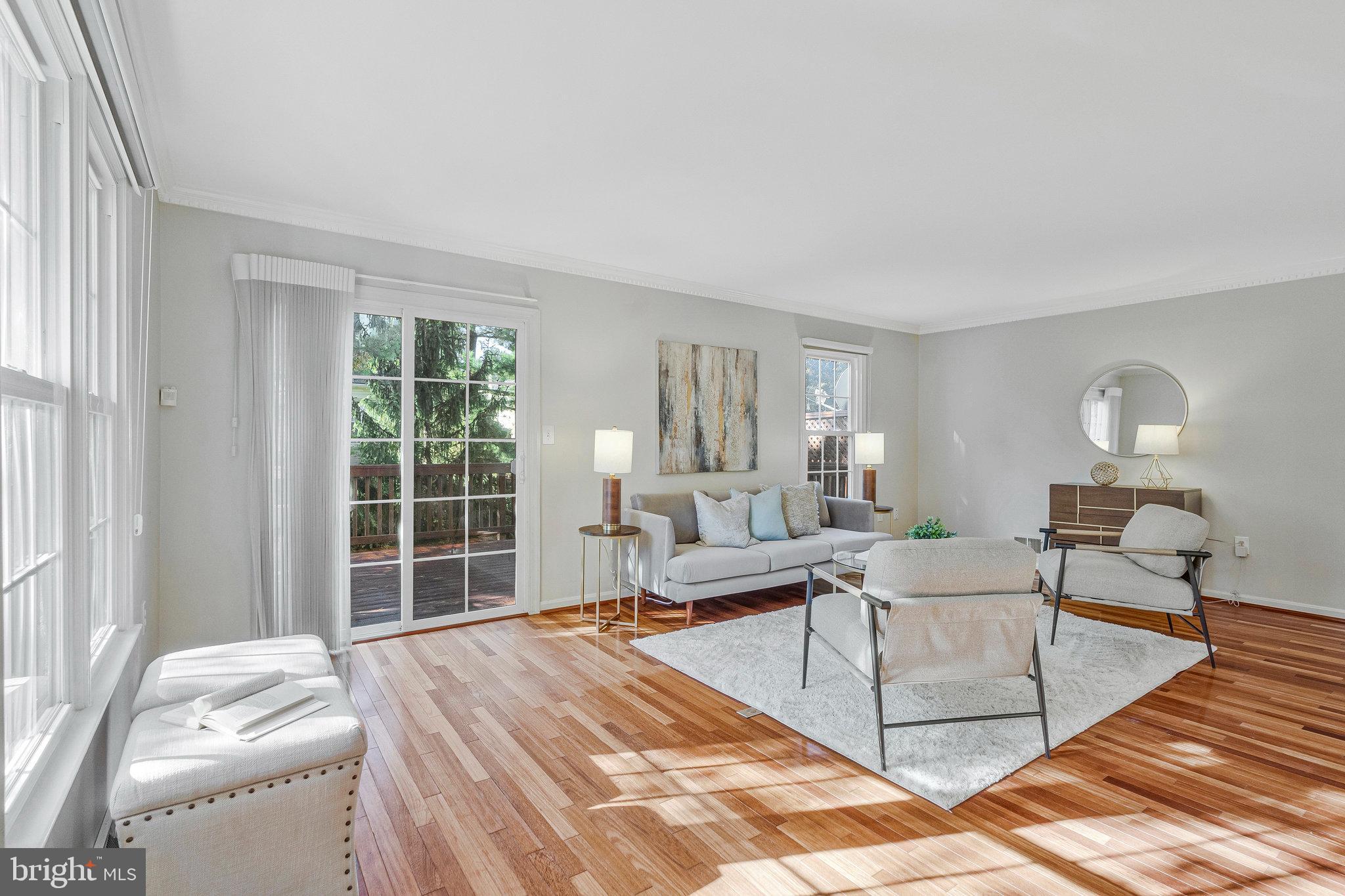 2043 Pieris Court Vienna, VA 22182 - Photo 3 of 43 a living room with furniture a lamp and a window