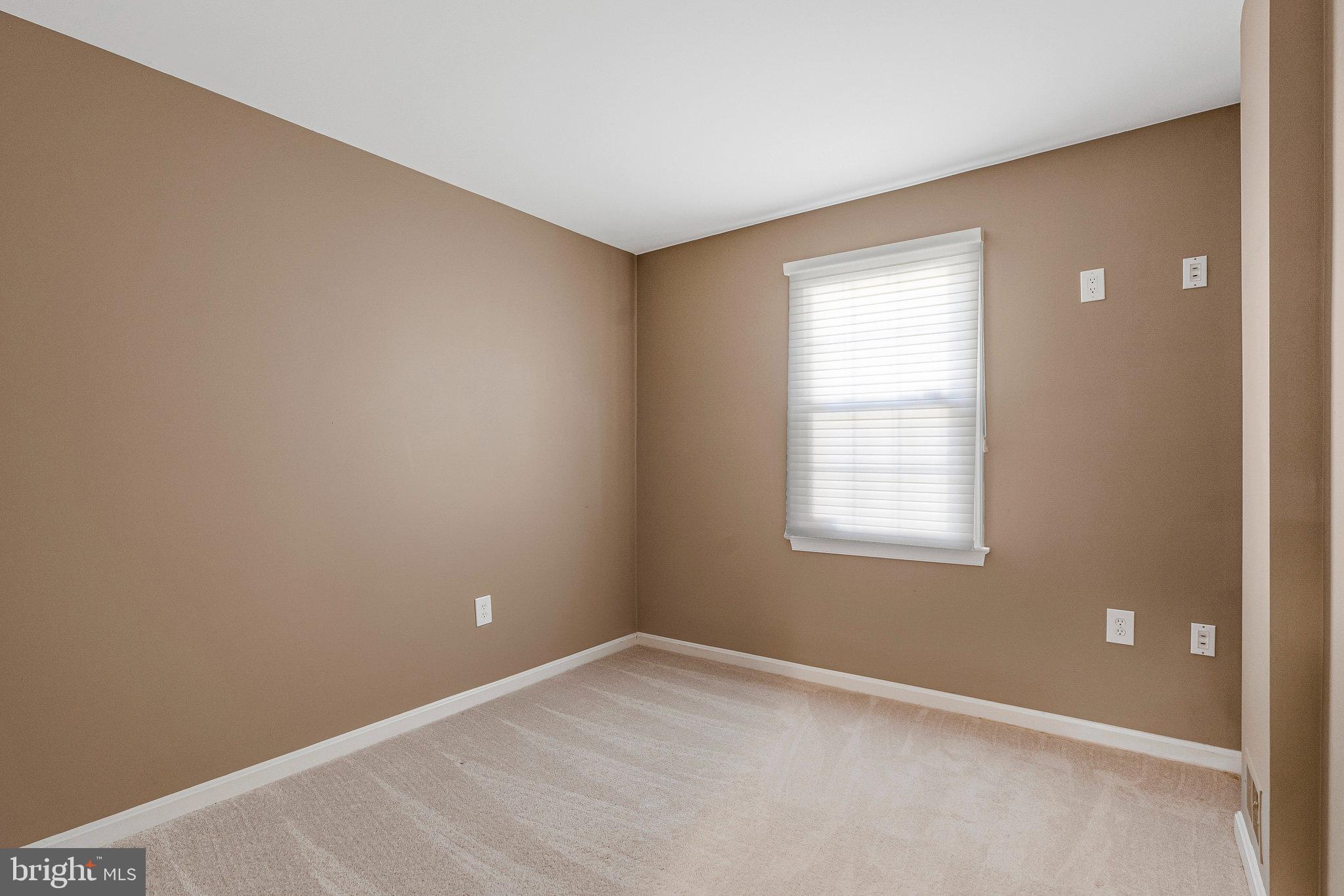 2043 Pieris Court Vienna, VA 22182 - Photo 31 of 43 an empty room with a window