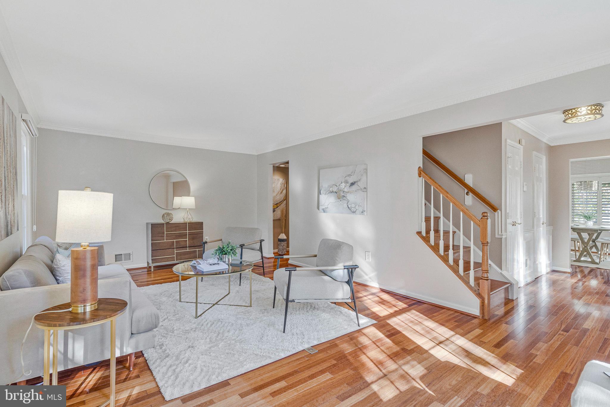 2043 Pieris Court Vienna, VA 22182 - Photo 5 of 43 a living room with fireplace furniture and a wooden floor
