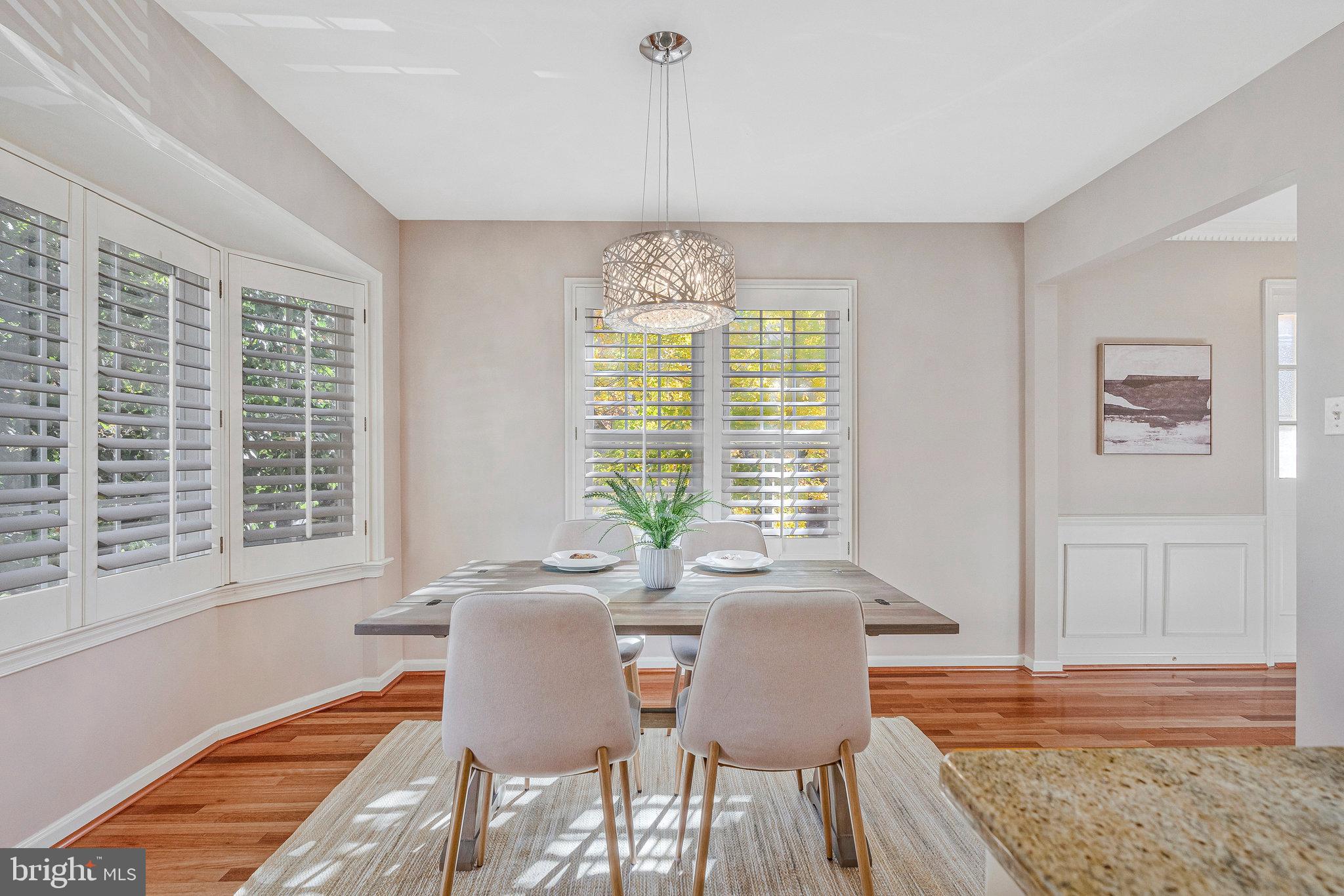 2043 Pieris Court Vienna, VA 22182 - Photo 8 of 43 a view of a dining room with furniture window and outside view