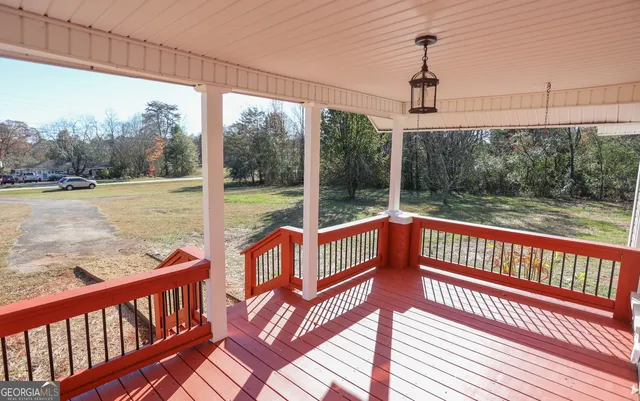 a view of a city street from a balcony