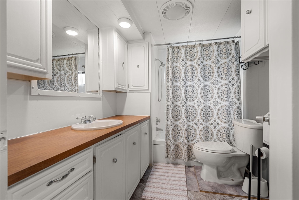 8 F Street Merrimac, MA 01860 - Photo 16 of 20 a bathroom with a sink toilet and shower