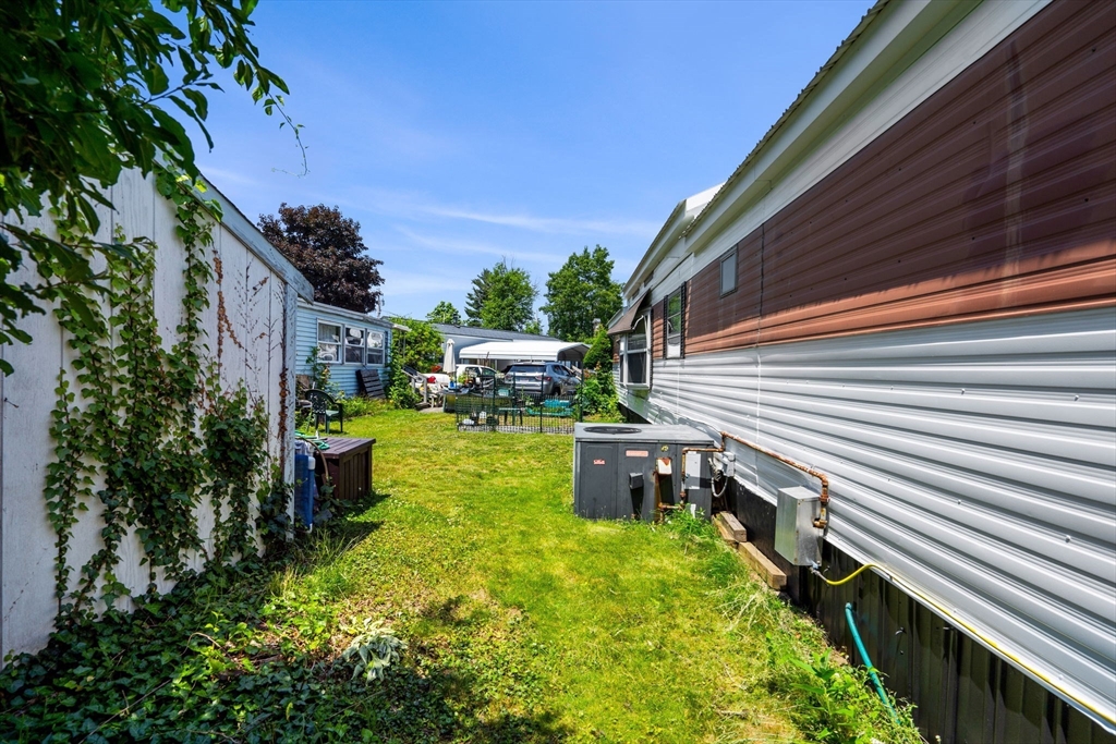 8 F Street Merrimac, MA 01860 - Photo 19 of 20 a backyard of a house with outdoor seating