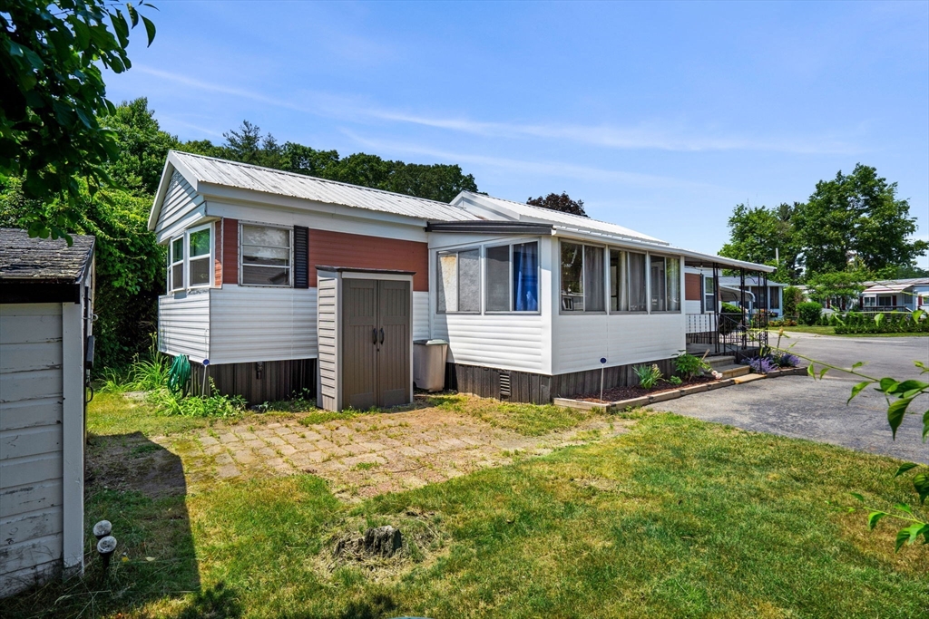 8 F Street Merrimac, MA 01860 - Photo 20 of 20 a view of a house with backyard and sitting area