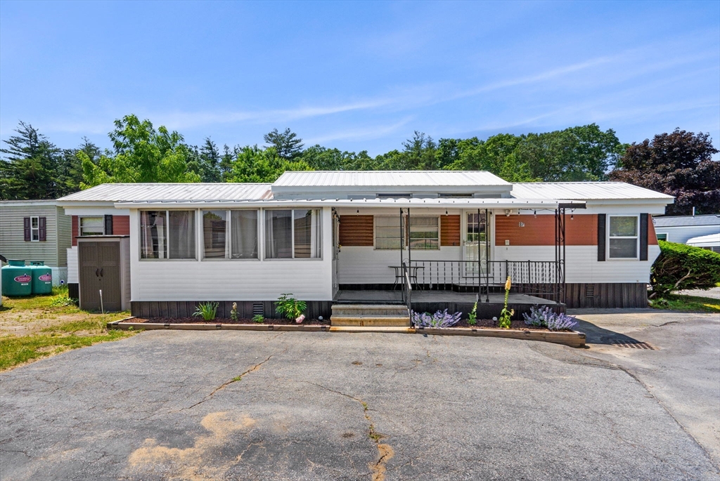 8 F Street Merrimac, MA 01860 - Photo 2 of 20 a view of a house with swimming pool and sitting area