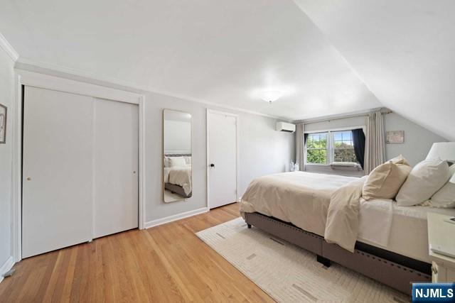 364 Rutland Avenue Teaneck, NJ 07666 - Photo 13 of 29 a bedroom with a bed and a window