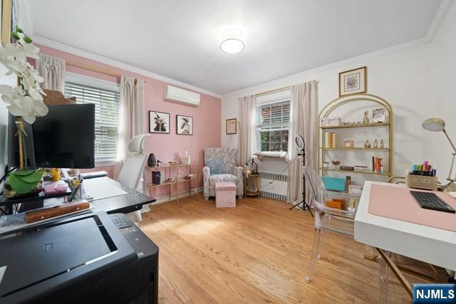 364 Rutland Avenue Teaneck, NJ 07666 - Photo 25 of 29 a living room with furniture and a flat screen tv