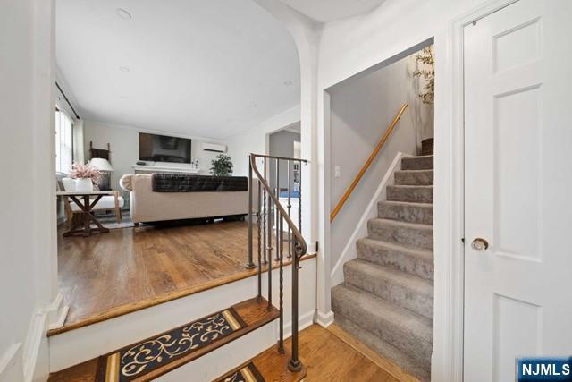 364 Rutland Avenue Teaneck, NJ 07666 - Photo 3 of 29 a living room with furniture and a flat screen tv