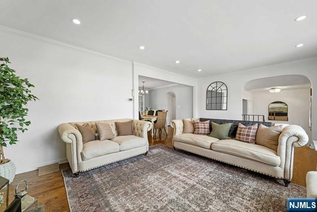 364 Rutland Avenue Teaneck, NJ 07666 - Photo 9 of 29 a living room with furniture and a couch