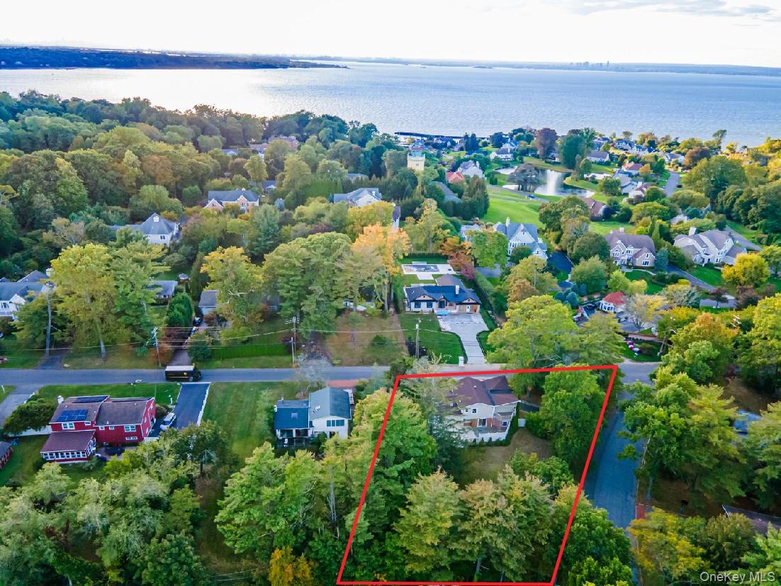 36 Red Spring Lane Glen Cove, NY 11542 - Photo 32 of 33 Aerial View Toward Waterfront – Elevated perspective showing proximity to scenic water views and a beautifully established neighborhood setting.