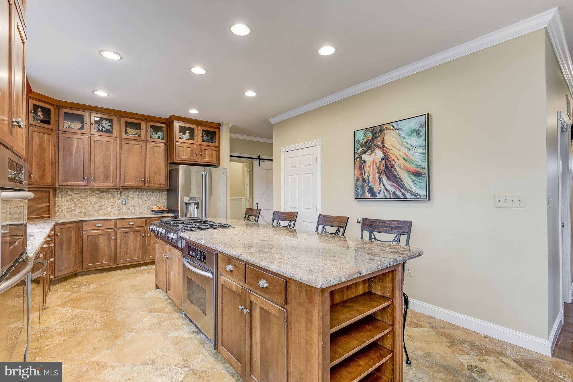 15611 Bushy Park Road Woodbine, MD 21797 - Photo 23 of 92 Island with cooktop and oven