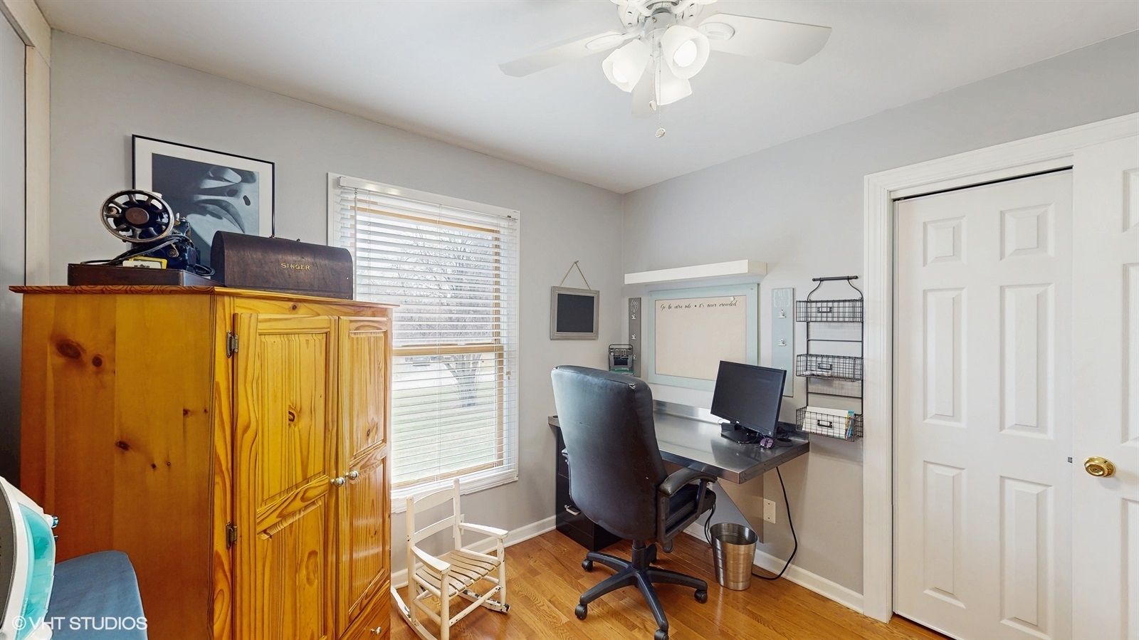 2606 Martin Drive Spring Grove, IL 60081 - Photo 11 of 32 a view of a workspace with furniture and a window