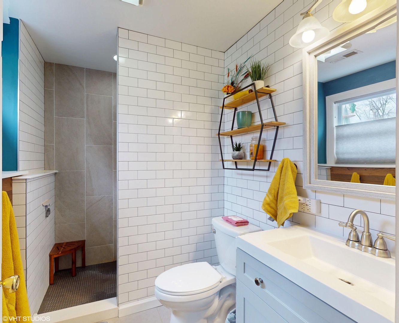 2606 Martin Drive Spring Grove, IL 60081 - Photo 19 of 32 a bathroom with a sink vanity mirror and toilet