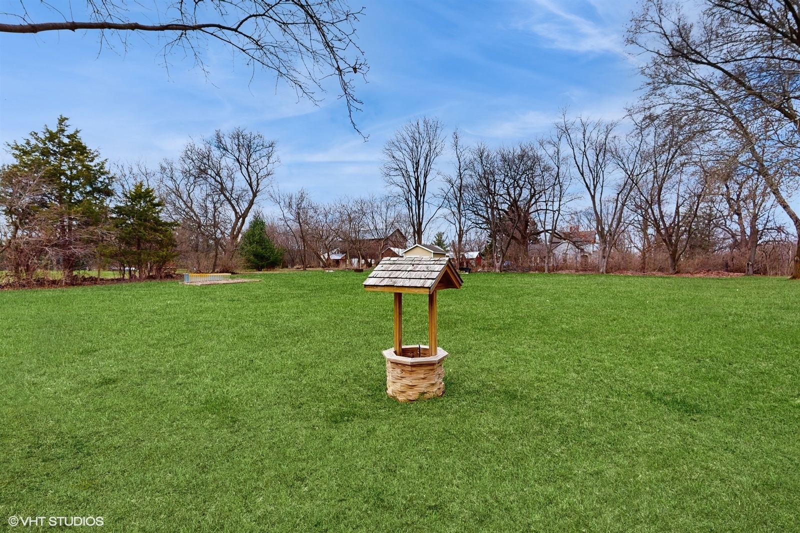 2606 Martin Drive Spring Grove, IL 60081 - Photo 26 of 32 a white house with a yard and trees