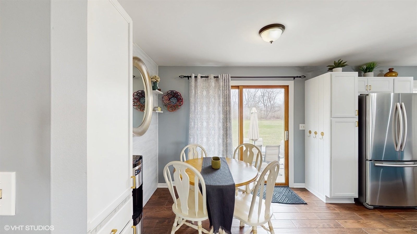 2606 Martin Drive Spring Grove, IL 60081 - Photo 5 of 32 a view of a dining room with furniture window and outside view