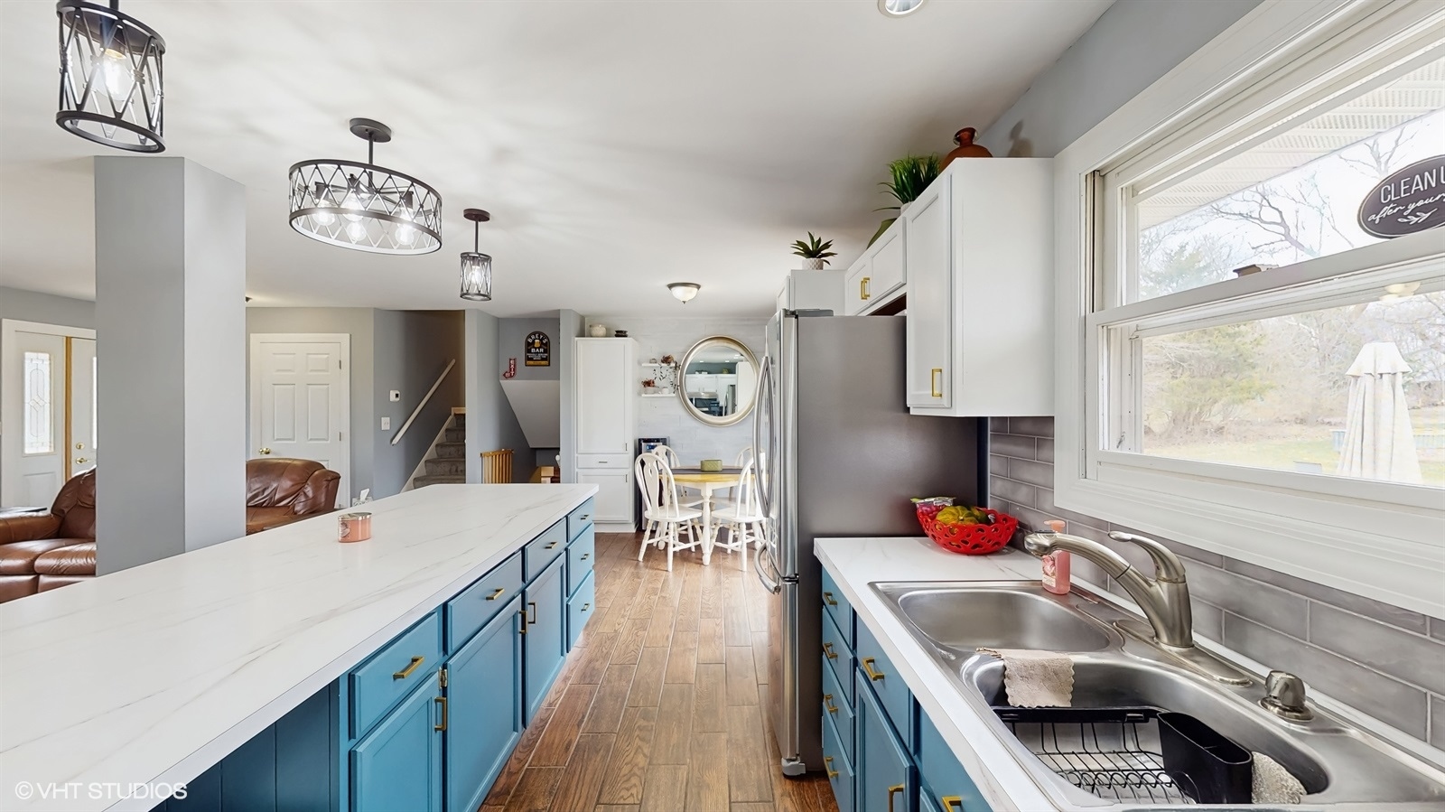2606 Martin Drive Spring Grove, IL 60081 - Photo 7 of 32 a kitchen with a sink stove and cabinets