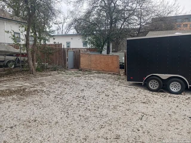 a view of a sink and a yard in the back