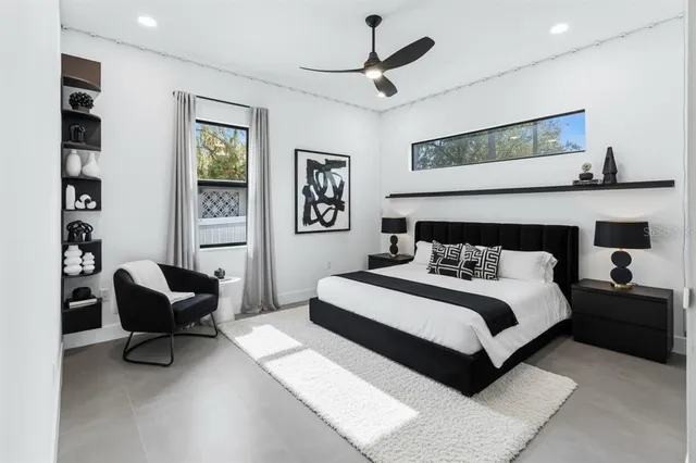 a bedroom with a bed and furniture