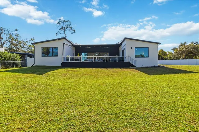 a view of a house with a swimming pool