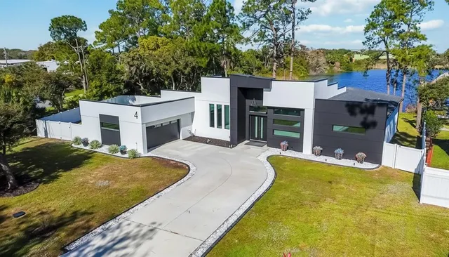 a view of a house with a swimming pool