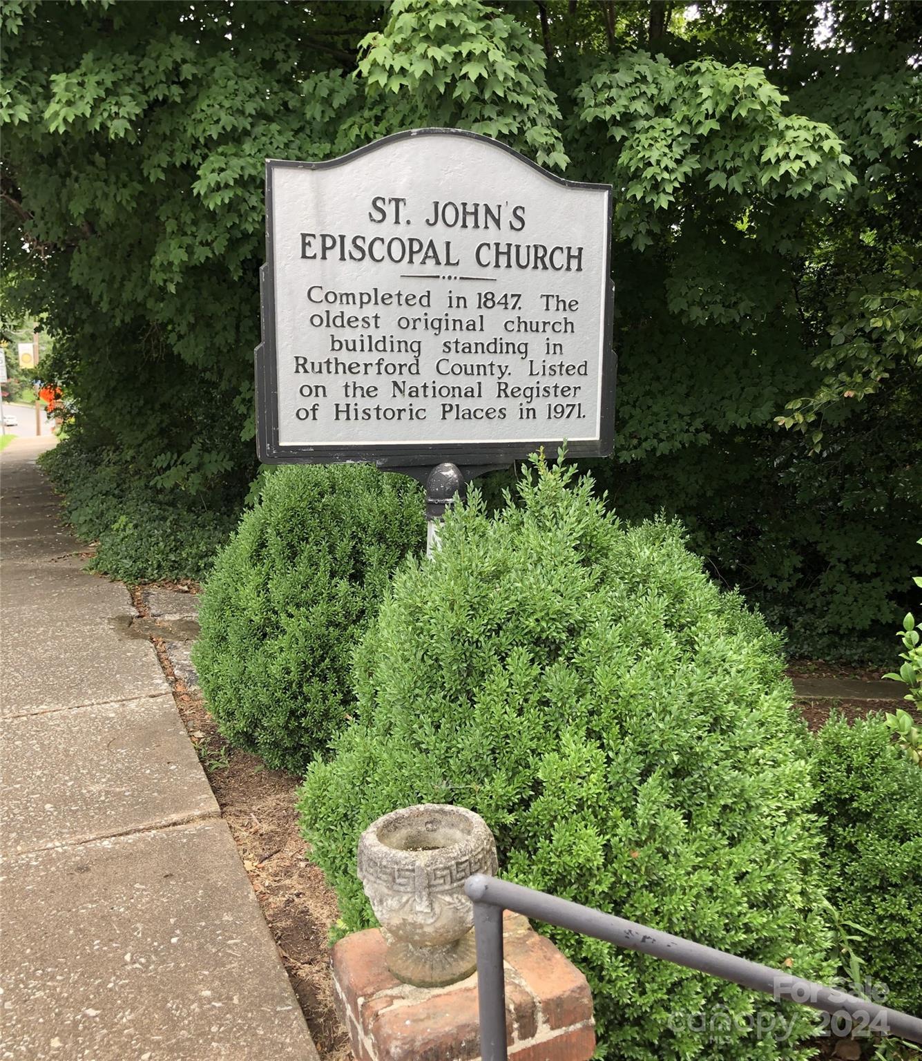 316 North Main Street Rutherfordton, NC 28139 - Photo 2 of 30 a sign on the side of the building