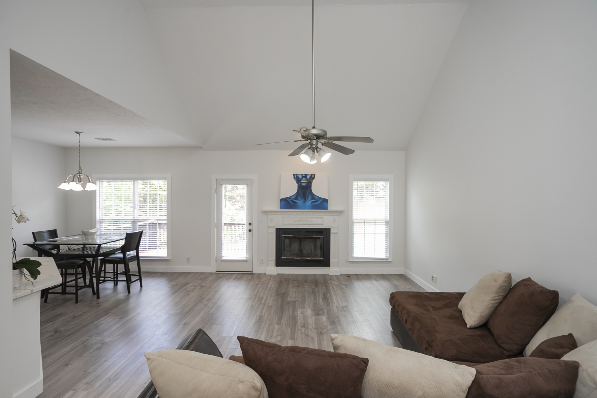 7337 Campton Road Nashville, TN 37211 - Photo 12 of 53 a living room with furniture a fireplace and a flat screen tv