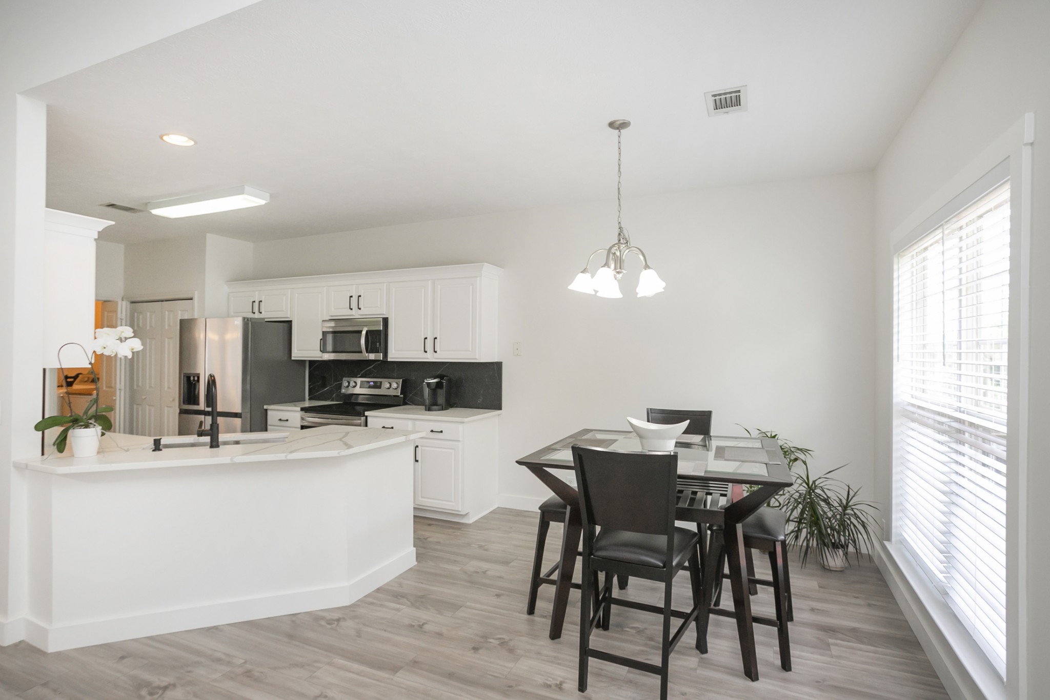 7337 Campton Road Nashville, TN 37211 - Photo 21 of 53 a view of a dining room with furniture window and wooden floor